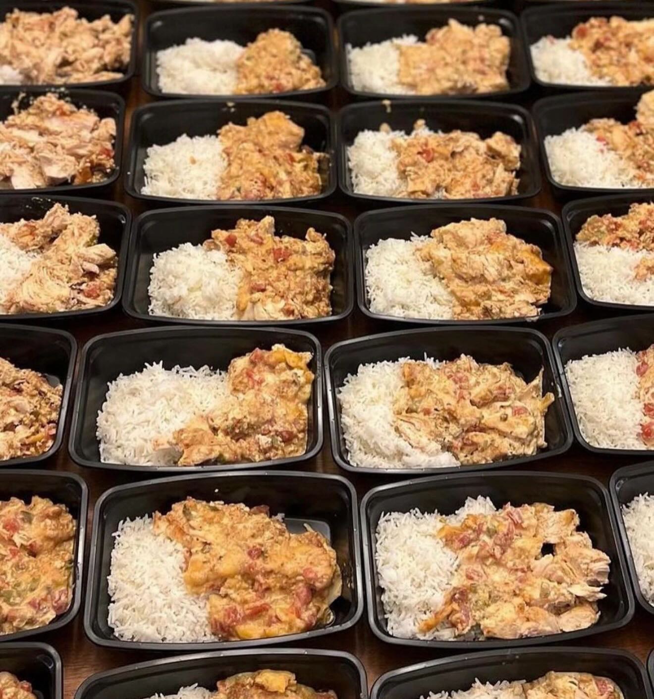 Tex-Mex queso chicken with tomatoes served beside basmati rice